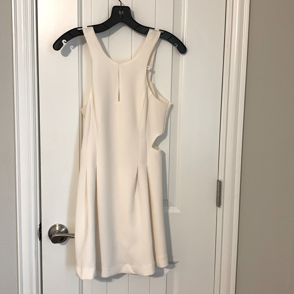 BCBGeneration mini dress with side cut outs and back zipper, size 0